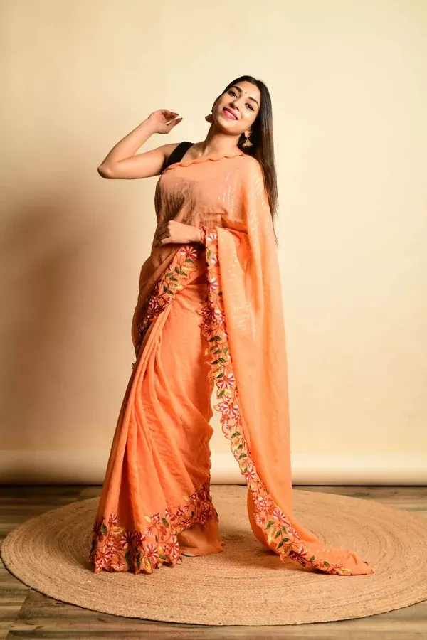 Vamsee Orange Georgette Designer Saree